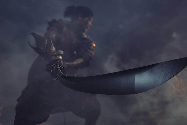 An in-game screenshot showing a man holding a sword.