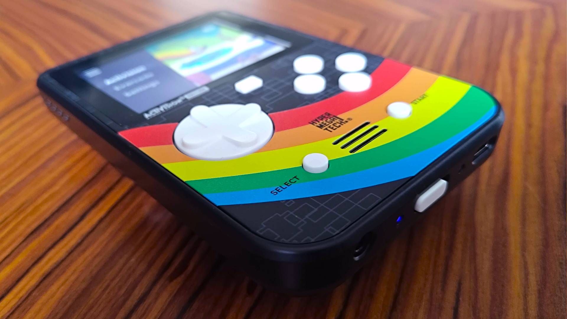 Super Pocket Activision Edition at an angle on woodgrain table.