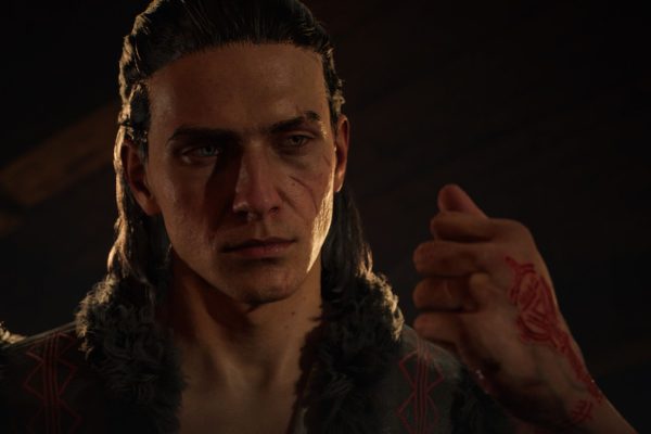 A crop of Coen looking at his closed fist in The Blood of Dawnwalker