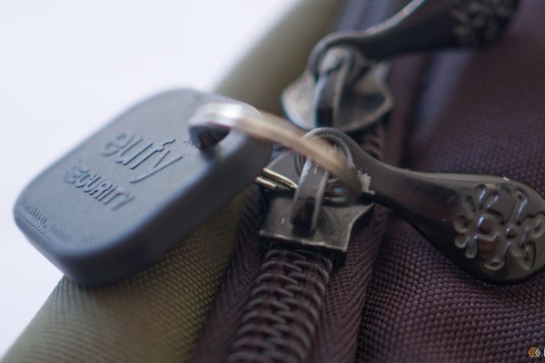 decoy eufy item tracker attached to a bag