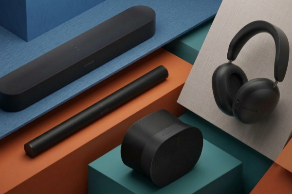 A collage of Sonos tech placed on multi-colored platforms, including the Beam Gen 2 soundbar, Arc Ultra soundbar, Era 300 speaker and Ace headphones.
