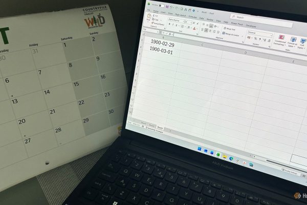 laptop displaying an excel spreadsheet with february 29 1900 and march 1 1900 beside an august 2026 calendar
