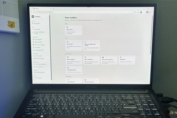 laptop screen displaying a utility dashboard titled your toolbox with various tool cards and a side navigation menu
