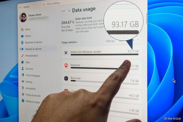my finger pointing at windows data usage setting showing high 93gb usage by system and windows updates