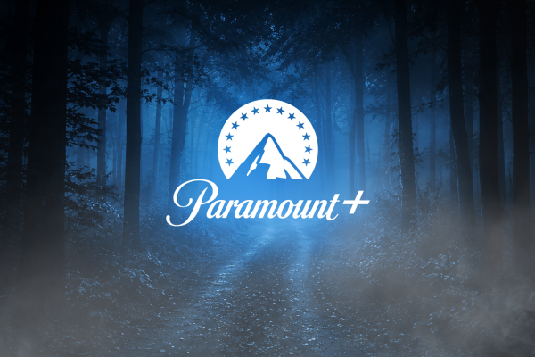 paramount logo in a dark foggy forest
