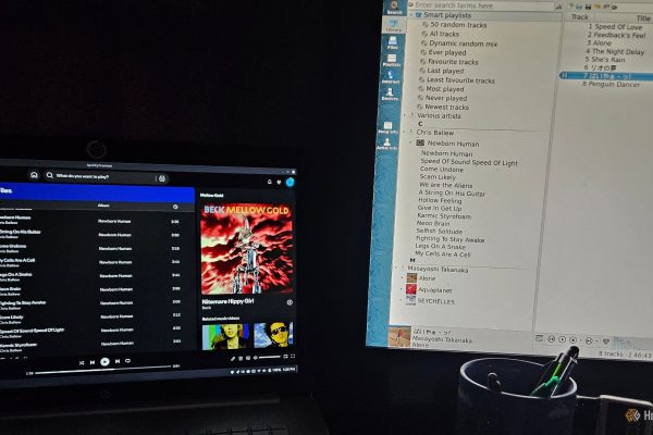 spotify and clementine open side by side on two different monitors